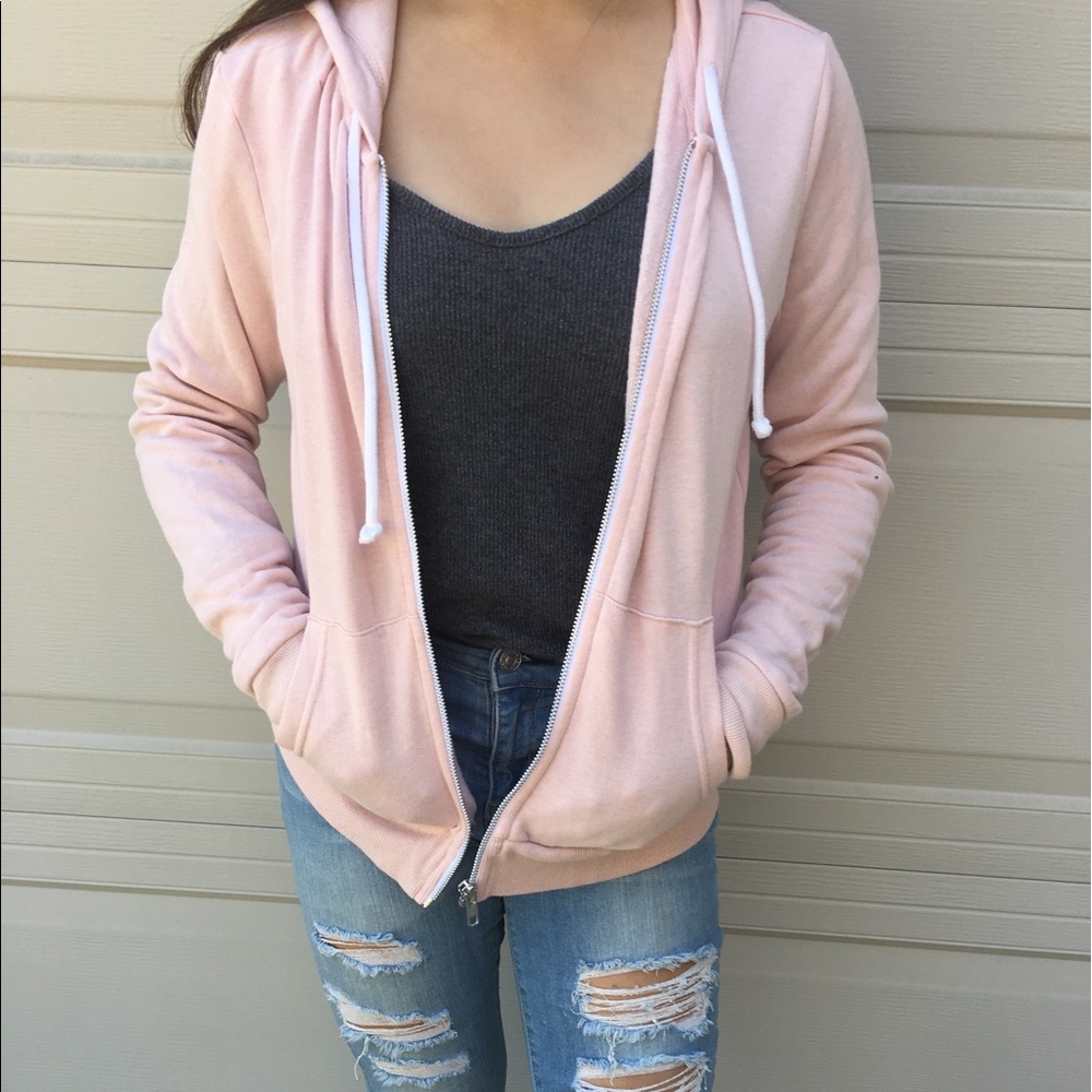 Light pink zip-up jacket with a hood